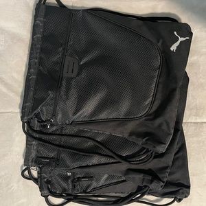 Black Puma cinch totes